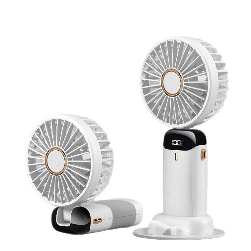 Le mini ventilateur déplié en position poignée, prêt à être utilisé