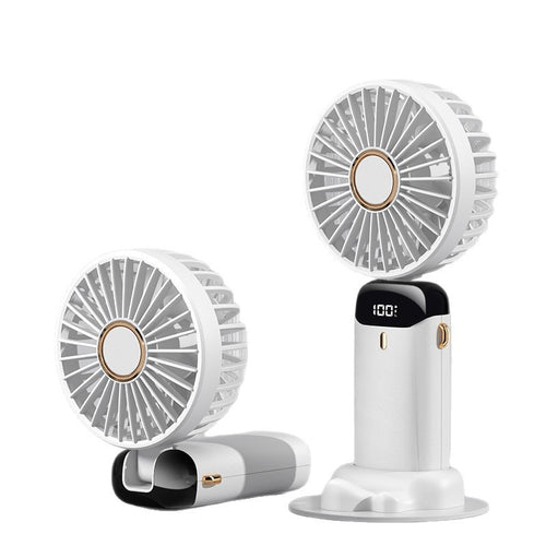 Le mini ventilateur déplié en position poignée, prêt à être utilisé